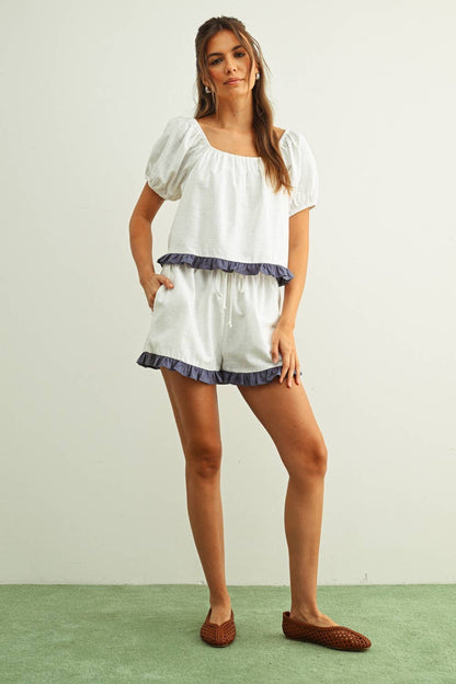 RUFFLED HEM LINEN SHORTS